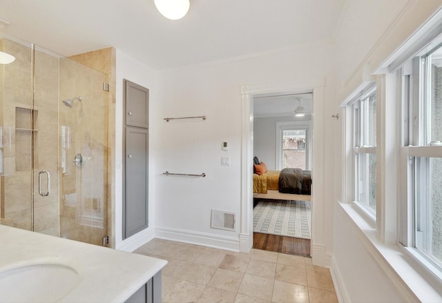 full bathroom with a shower stall, ornamental molding, tile patterned flooring, and visible vents