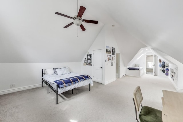 bedroom featuring ceiling fan, baseboards, lofted ceiling, and carpet
