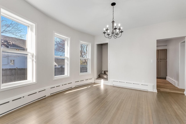 280 Westerfield Pl, Grayslake, IL 60030 - interior space with hardwood / wood-style flooring, a baseboard radiator, and a chandelier