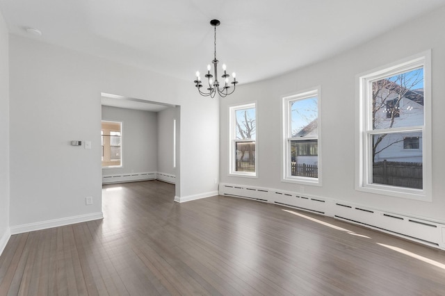 280 Westerfield Pl, Grayslake, IL 60030 - unfurnished dining area with baseboard heating, an inviting chandelier, dark wood-style floors, and baseboards