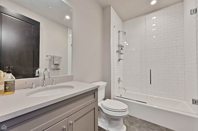 full bathroom with vanity, recessed lighting, combined bath / shower with glass door, and toilet