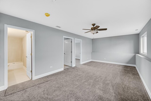 1409 172nd St, Hazel Crest, IL 60429 - unfurnished bedroom featuring visible vents, baseboards, a spacious closet, a ceiling fan, and carpet flooring