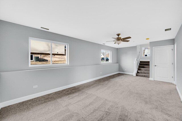 1409 172nd St, Hazel Crest, IL 60429 - unfurnished living room featuring baseboards, stairway, ceiling fan, and carpet