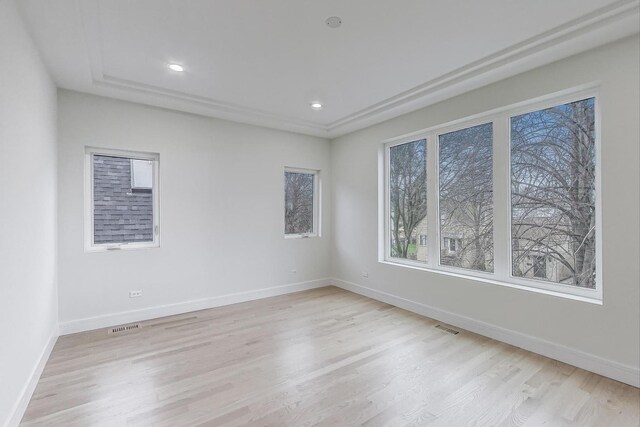 3242 N Kostner Ave, Chicago, IL 60641 - empty room with light wood-style floors, baseboards, and visible vents