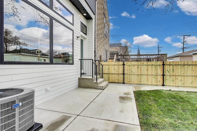 3242 N Kostner Ave, Chicago, IL 60641 - view of patio / terrace featuring fence and central air condition unit