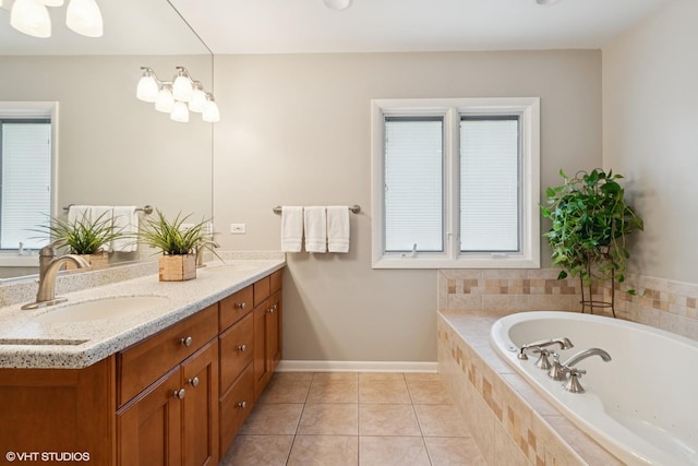 1831 Ellendale Dr, Northbrook, IL 60062 - bathroom with tile patterned floors, a bath, double vanity, and baseboards
