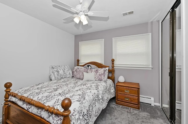 10922 Massasoit Ave, Chicago Ridge, IL 60415 - carpeted bedroom with a ceiling fan, visible vents, baseboard heating, a baseboard radiator, and baseboards
