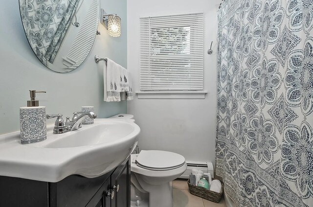 10922 Massasoit Ave, Chicago Ridge, IL 60415 - full bathroom with a shower with shower curtain, vanity, baseboard heating, tile patterned flooring, and toilet
