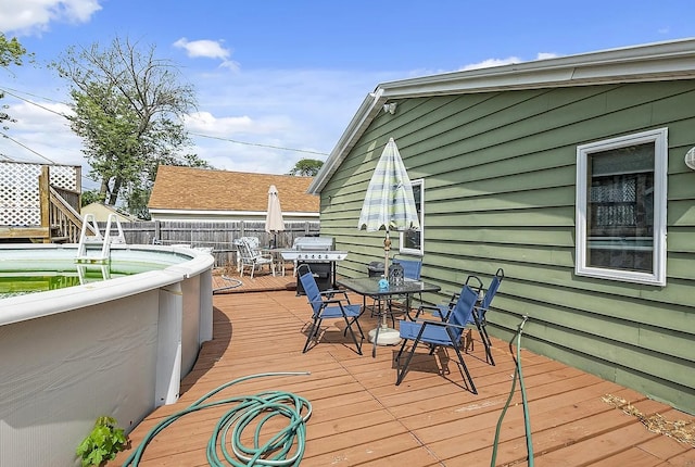 10922 Massasoit Ave, Chicago Ridge, IL 60415 - wooden terrace with outdoor dining area and fence