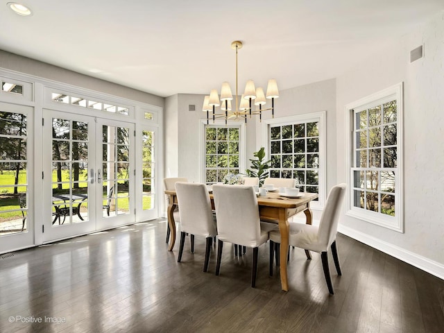 116 Springlake Ave, Hinsdale, IL 60521 - dining space featuring dark wood finished floors, an inviting chandelier, french doors, and baseboards