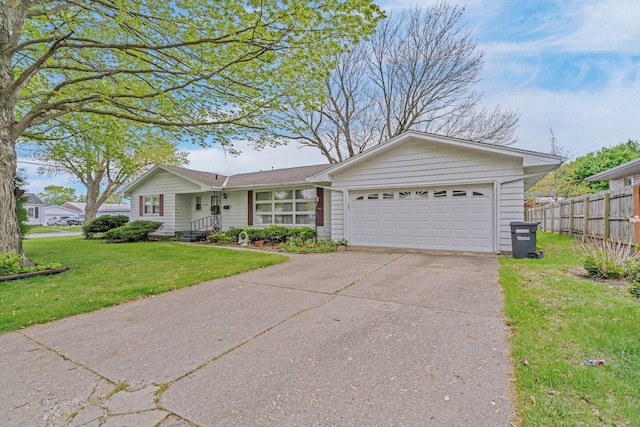 102 Robinson Dr, Morris, IL 60450 - single story home with an attached garage and concrete driveway