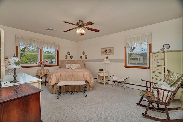 102 Robinson Dr, Morris, IL 60450 - carpeted bedroom featuring a ceiling fan