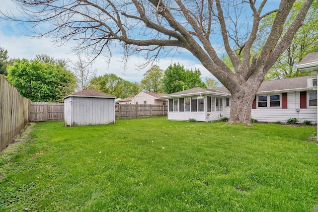 102 Robinson Dr, Morris, IL 60450 - view of yard with a shed, an outbuilding, and a sunroom