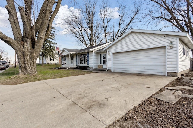 313 W S St, Pearl City, IL 61062 - ranch-style home featuring a garage, a front yard, and concrete driveway