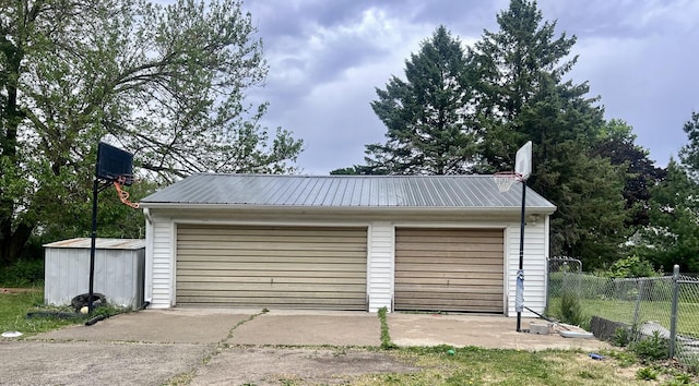 2215 Deets Rd, Sterling, IL 61081 - detached garage featuring fence