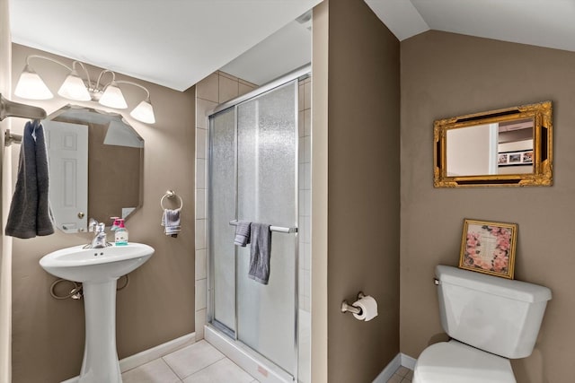 24117 Nottingham Ave, Plainfield, IL 60585 - bathroom with toilet, a stall shower, baseboards, and tile patterned flooring