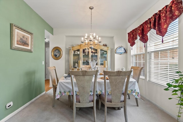 24117 Nottingham Ave, Plainfield, IL 60585 - carpeted dining room with a chandelier and baseboards