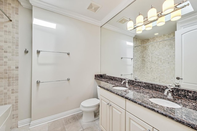bathroom featuring toilet, crown molding, baseboards, double vanity, and tile patterned flooring
