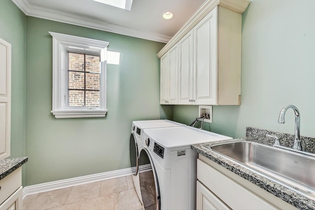 laundry area with washer and dryer, baseboards, cabinet space, crown molding, and recessed lighting