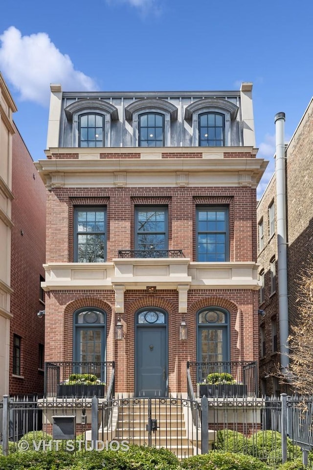 2140 N Seminary Ave, Chicago, IL 60614 - view of front of property featuring brick siding and a fenced front yard