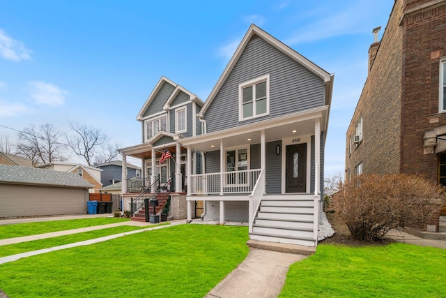 4616 N Kostner Ave, Chicago, IL 60630 - bungalow featuring a front yard, stairway, and covered porch