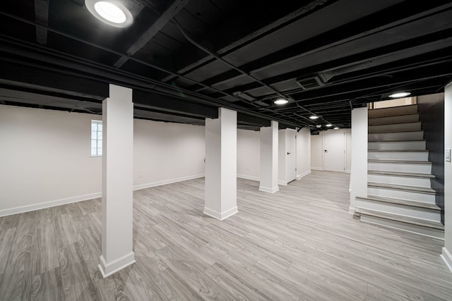 4616 N Kostner Ave, Chicago, IL 60630 - basement featuring baseboards, wood finished floors, and stairs