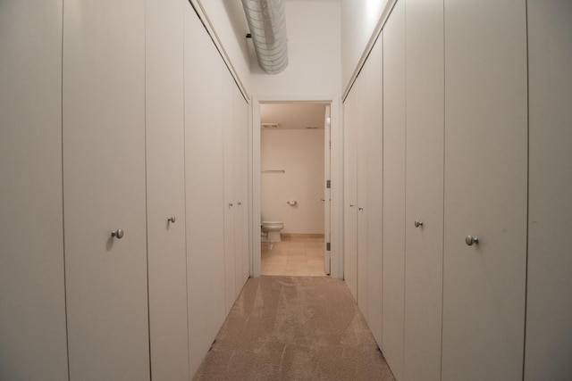 565 W Quincy St Unit 510, Chicago, IL 60661 - hallway featuring light carpet and light tile patterned floors