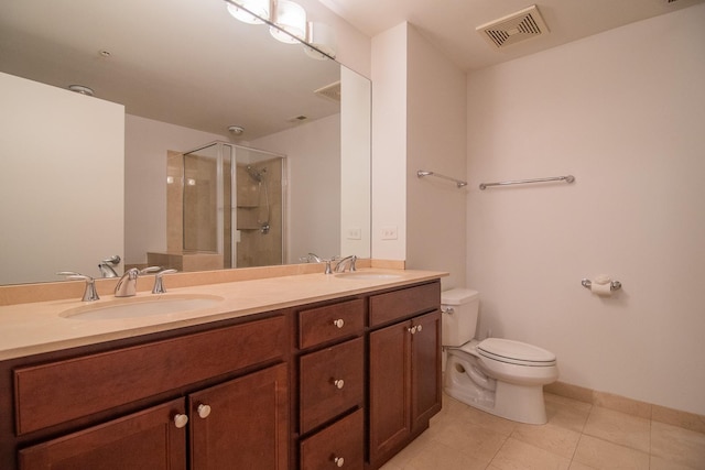 565 W Quincy St Unit 510, Chicago, IL 60661 - bathroom featuring visible vents, toilet, a stall shower, and a sink