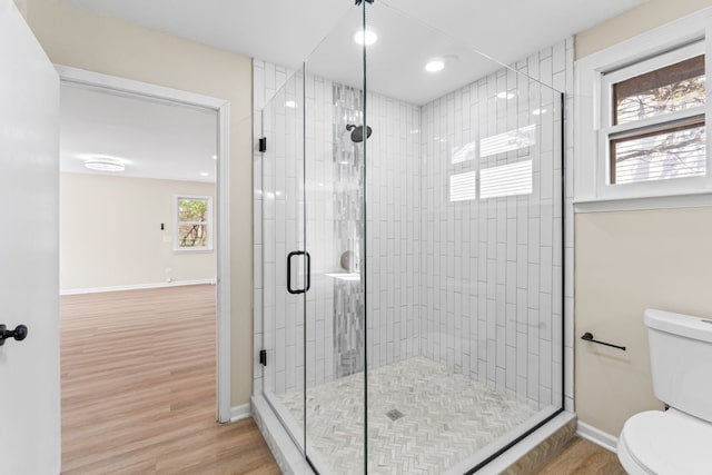 7730 Virginia Ct, Willowbrook, IL 60527 - full bathroom featuring recessed lighting, toilet, wood finished floors, a stall shower, and baseboards