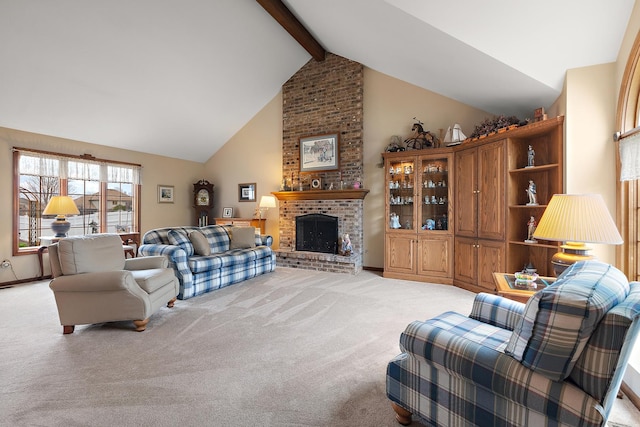 living room with beam ceiling, a brick fireplace, high vaulted ceiling, and light colored carpet