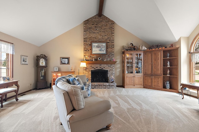 living room featuring a fireplace, light carpet, beamed ceiling, and a wealth of natural light