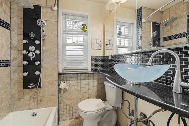 1856 Bernice Rd, South Holland, IL 60473 - bathroom with tile walls, tub / shower combination, tile patterned flooring, and toilet