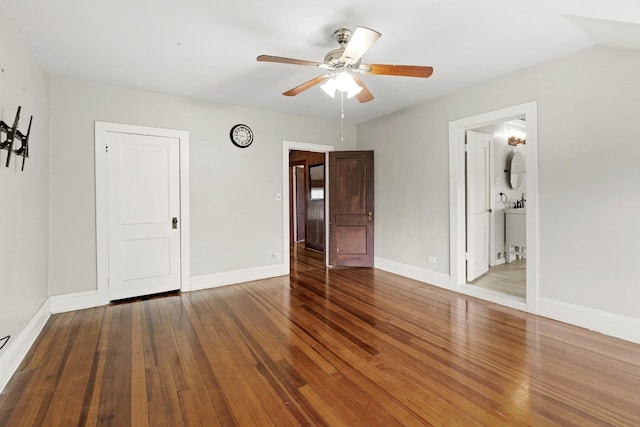 1856 Bernice Rd, South Holland, IL 60473 - unfurnished bedroom with hardwood / wood-style flooring, baseboards, and a ceiling fan