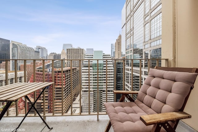 balcony featuring a city view