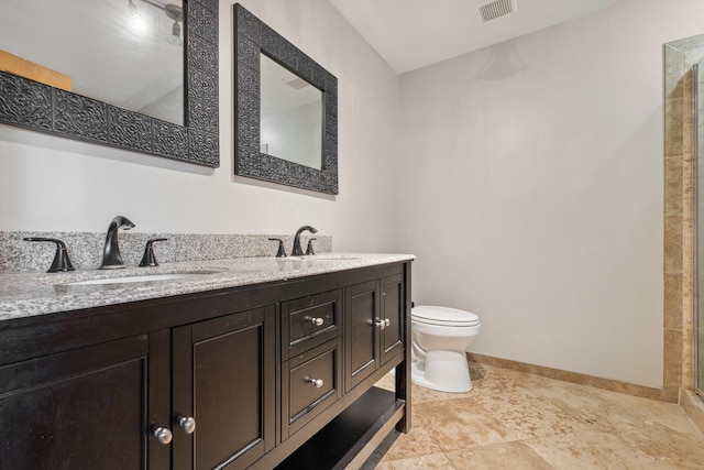 full bathroom featuring toilet, double vanity, baseboards, and a tile shower