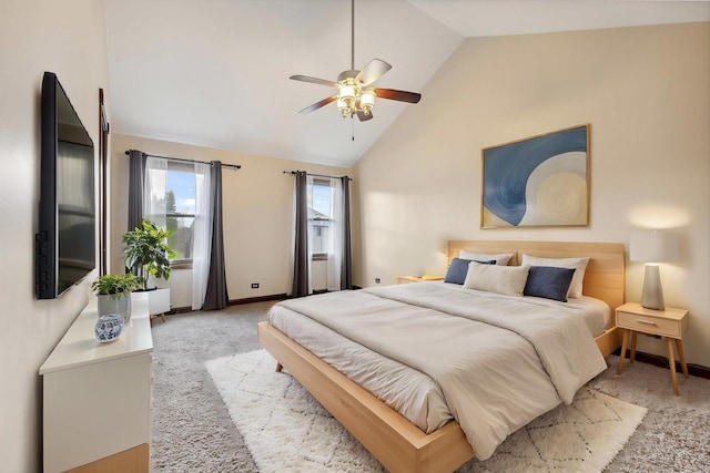 carpeted bedroom featuring baseboards, high vaulted ceiling, and ceiling fan