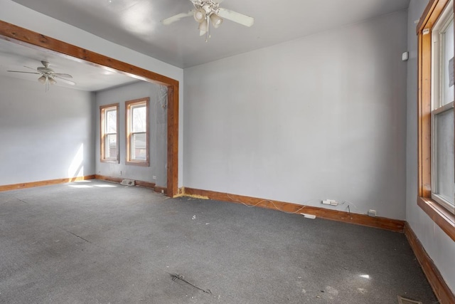 7521 S Parnell Ave, Chicago, IL 60620 - unfurnished room featuring a ceiling fan, baseboards, and carpet floors