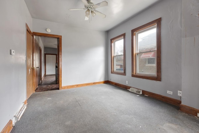 7521 S Parnell Ave, Chicago, IL 60620 - empty room featuring baseboards, a ceiling fan, visible vents, and carpet