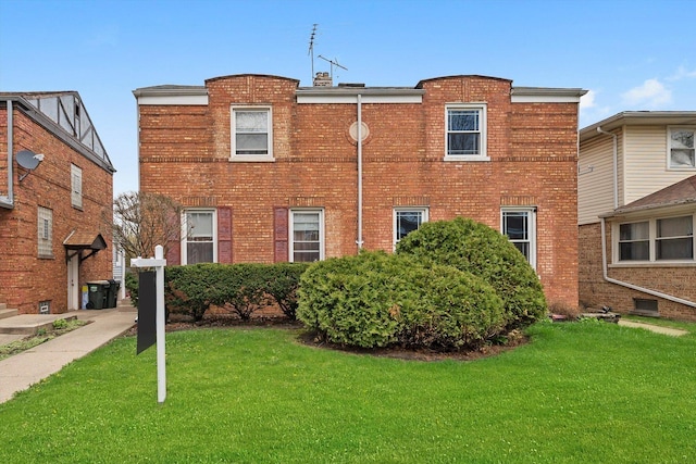 429 Geneva Ave, Bellwood, IL 60104 - exterior space featuring brick siding and a yard