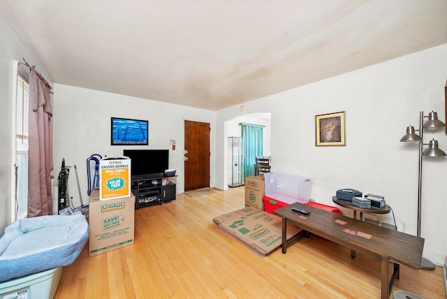 429 Geneva Ave, Bellwood, IL 60104 - living room with arched walkways and light wood finished floors