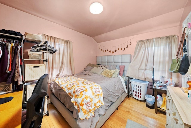 429 Geneva Ave, Bellwood, IL 60104 - bedroom with lofted ceiling and hardwood / wood-style floors