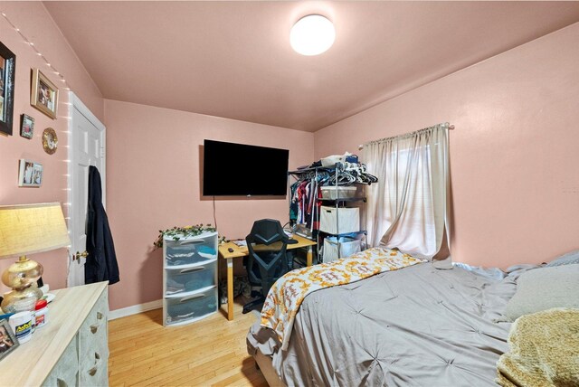 429 Geneva Ave, Bellwood, IL 60104 - bedroom featuring wood finished floors and baseboards