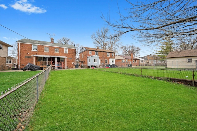 429 Geneva Ave, Bellwood, IL 60104 - rear view of house with a yard, a fenced backyard, and a residential view