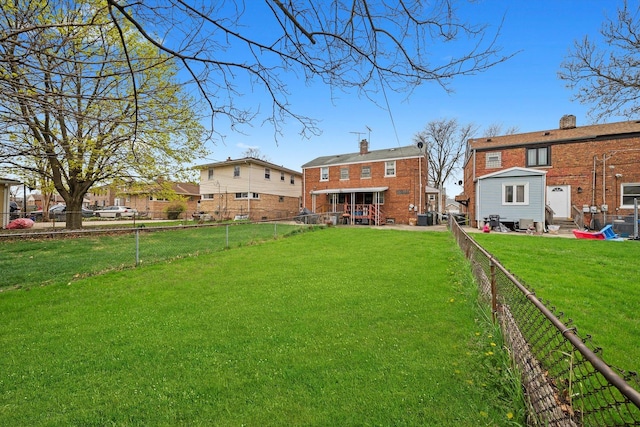 429 Geneva Ave, Bellwood, IL 60104 - view of yard with a fenced backyard, entry steps, and central air condition unit
