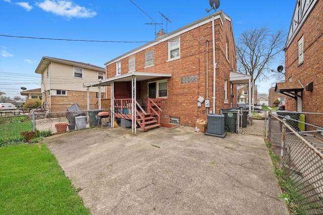 429 Geneva Ave, Bellwood, IL 60104 - back of property with a gate, central AC, a patio, and a fenced backyard