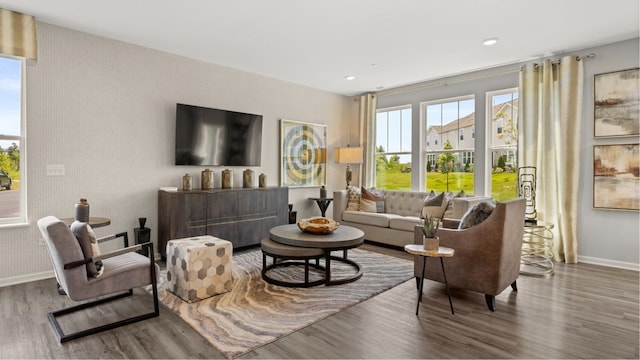 12117 Kelsey Dr, Huntley, IL 60142 - living room featuring wood finished floors, baseboards, and recessed lighting