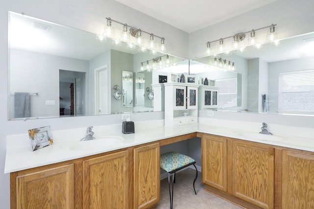 bathroom with vanity and visible vents