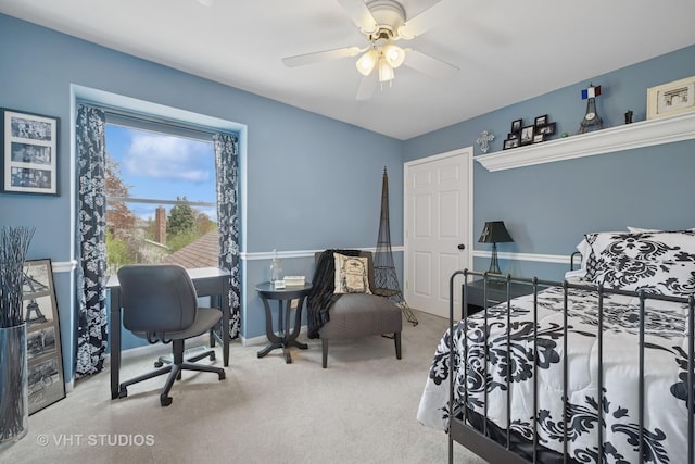 bedroom with baseboards, a ceiling fan, and carpet flooring
