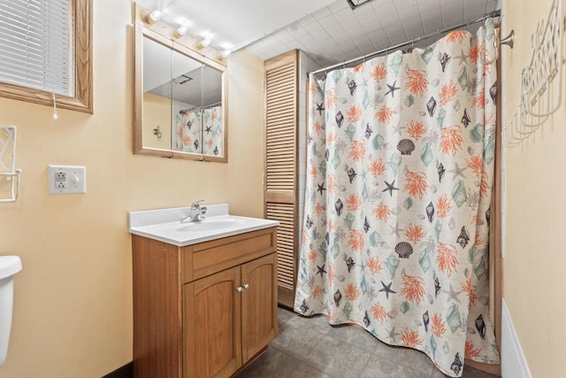 bathroom with vanity and a shower with curtain