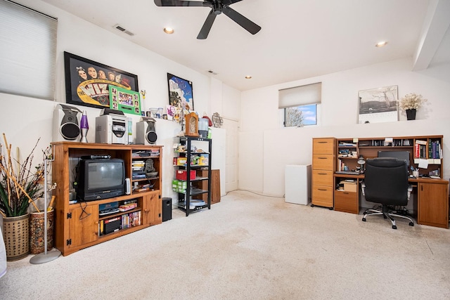 office featuring recessed lighting, carpet floors, visible vents, and a ceiling fan